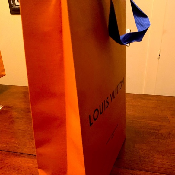 Brand new authentic Luise Vuitton bag with string handles must have !